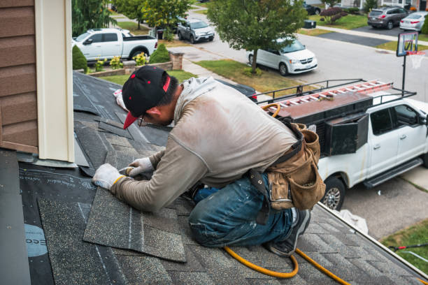 Professional Gutter Installation technician working in Centereach, NY